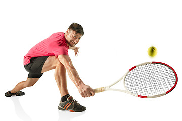 Image showing one caucasian man playing tennis player isolated on white background