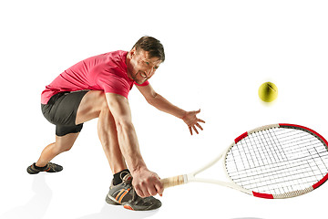 Image showing one caucasian man playing tennis player isolated on white background