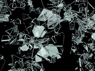 Image showing Pieces of broken or cracked glass on black