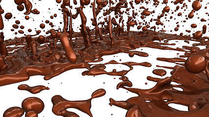 Image showing Melting chocolate or cocoa coffee splashes and droplets