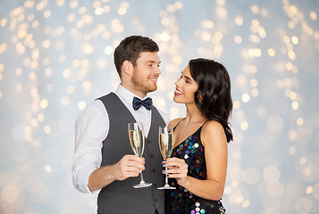 Image showing happy couple with champagne glasses at party