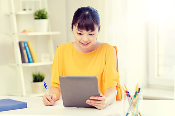 Image showing asian woman student with tablet pc at home