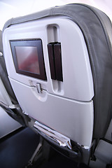 Image showing Details of old seats blank screen monitor on the plane