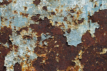 Image showing Old blue rusty metal door