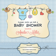 Image showing Baby shower card with baby clothings