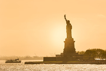 Image showing Statue of Liberty silhouette in sunset, New York City, USA