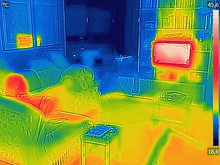 Image showing Thermal image Photo while a woman is watching television
