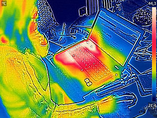 Image showing Thermal image Photo while woman on a laptop 