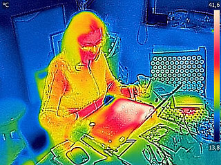 Image showing Thermal image Photo while woman on a laptop 