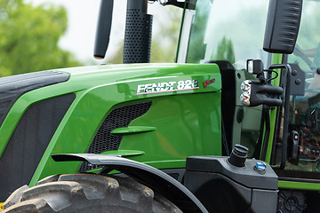 Image showing Closeup of the agricultural tractor FENDT 828 Vario on the fields