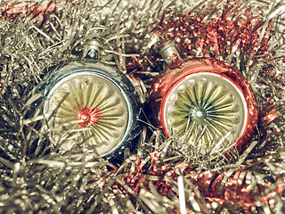 Image showing Vintage looking Christmas bauble and tinsel