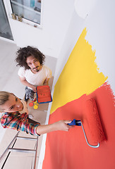 Image showing couple painting interior wall