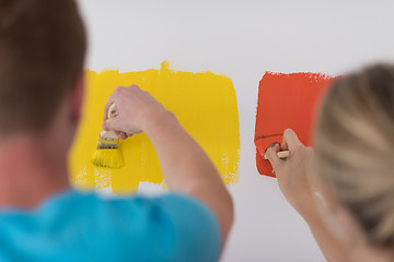 Image showing couple painting interior wall