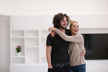 Image showing couple hugging in their new home