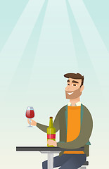 Image showing Man drinking wine in the restaurant.