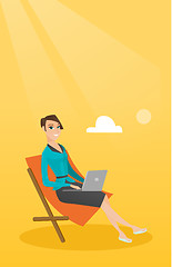 Image showing Businesswoman working on laptop at the beach.