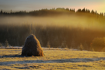 Image showing haystack in mountain rural area