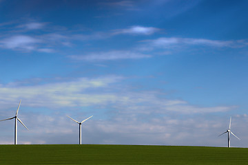 Image showing windmills for green energy in the field