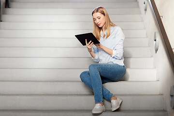 Image showing woman or student with tablet pc sitting on stairs