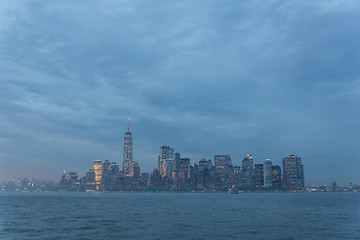 Image showing Panoramic view of storm over Lower Manhattan from Ellis Island at dusk, New York City.