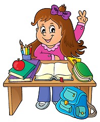 Image showing Girl behind school desk theme image 1