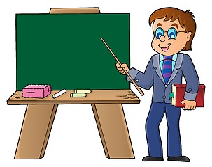 Image showing Man teacher standing by schoolboard