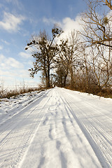 Image showing traces of the car on snow