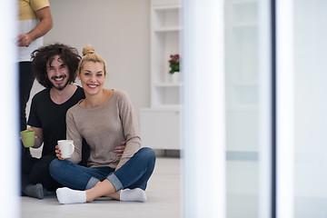 Image showing young couple in their new home