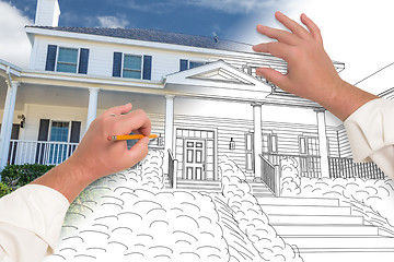 Image showing Male Hands Sketching with Pencil the Outline of a House with Pho