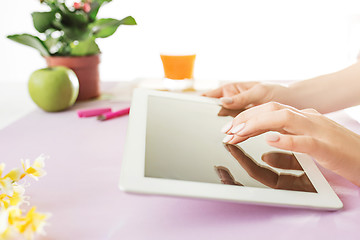 Image showing Woman and fruit diet while working on computer in office