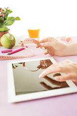 Image showing Woman and fruit diet while working on computer in office