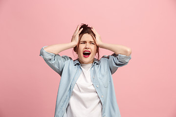 Image showing Beautiful woman in stress isolated on pink