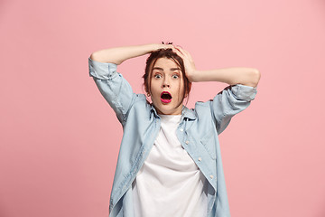 Image showing Beautiful woman in stress isolated on pink