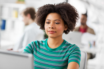 Image showing african woman with laptop computer at office