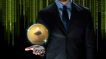 Image showing businessman with ethereum coin over binary code