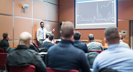 Image showing Skiled Public Speaker Giving a Talk at Business Meeting.