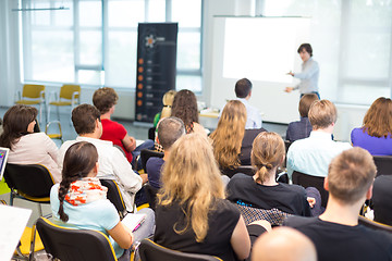 Image showing Speaker giving presentation on business conference.