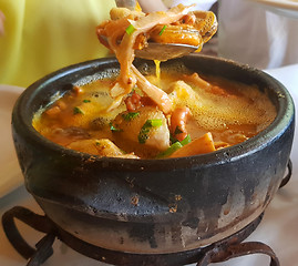 Image showing clay pan with seafood 