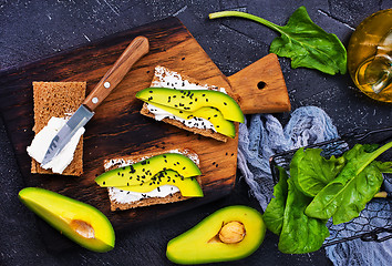 Image showing bread with cheese and with avocado 