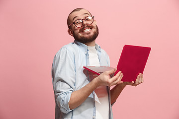 Image showing Businessman hugging laptop