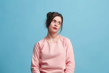 Image showing Beautiful bored woman bored isolated on blue background