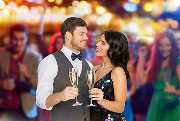 Image showing happy couple with champagne glasses at party