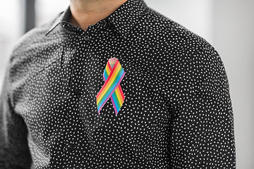 Image showing man with gay pride rainbow awareness ribbon