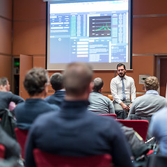 Image showing Skiled Public Speaker Giving a Talk at Business Meeting.