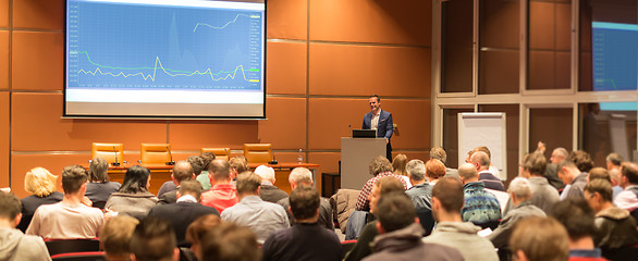 Image showing Business speaker giving a talk at business conference event.