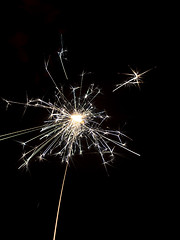 Image showing typical sparkler with dark background