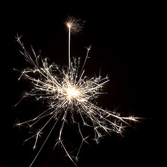 Image showing typical sparkler with dark background