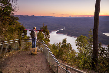 Image showing Hiker enjoying the river valley views