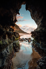 Image showing Nature\'s window - sunrise beach cave