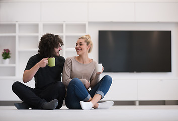 Image showing young couple in their new home